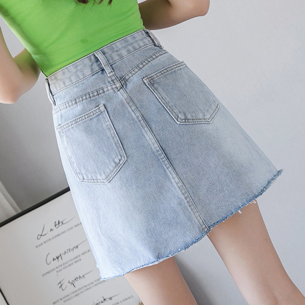 Kõrge vöökoha ja rebenenud motiividega vabaaja naiste teksaseelik