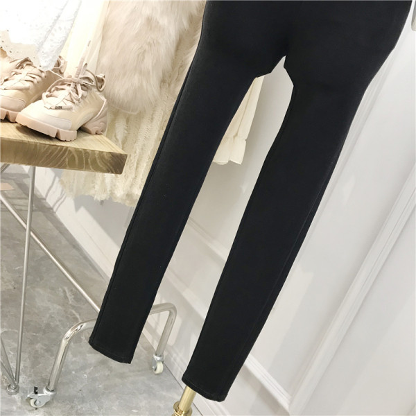 Női fekete nadrág Karcsú modell magas derékkal és keresztkötéssel