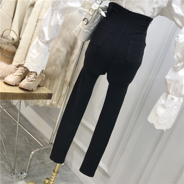 Női fekete nadrág Karcsú modell magas derékkal és keresztkötéssel