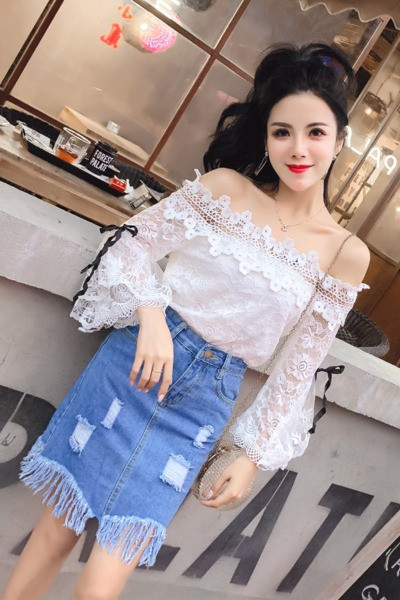 Új modell farmerszoknya szakadt motívumokkal és rojtokkal