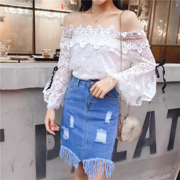 Új modell farmerszoknya szakadt motívumokkal és rojtokkal