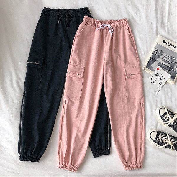 Alkalmi női nadrág elasztikus derékkal, oldalzsebekkel és cipzárral