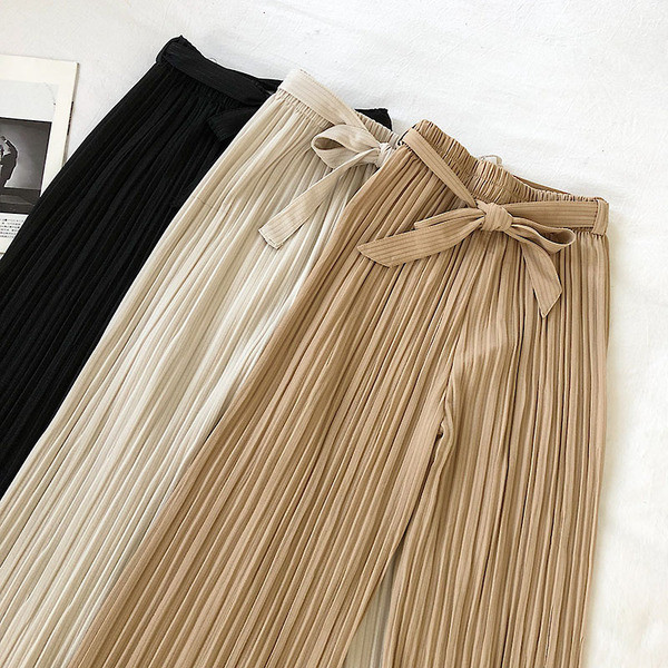 Jelenlegi hajtogatott női nadrág széles modell magas derékkal és övvel