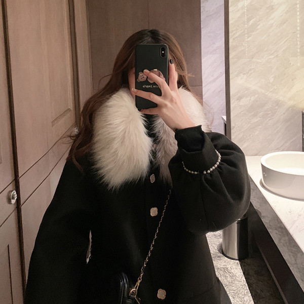 Naiste talvemantli lai mudel sulekrae ja taskutega