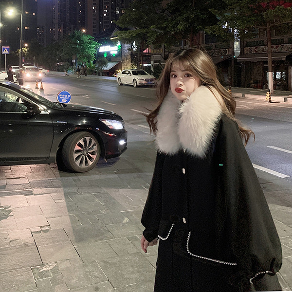 Naiste talvemantli lai mudel sulekrae ja taskutega