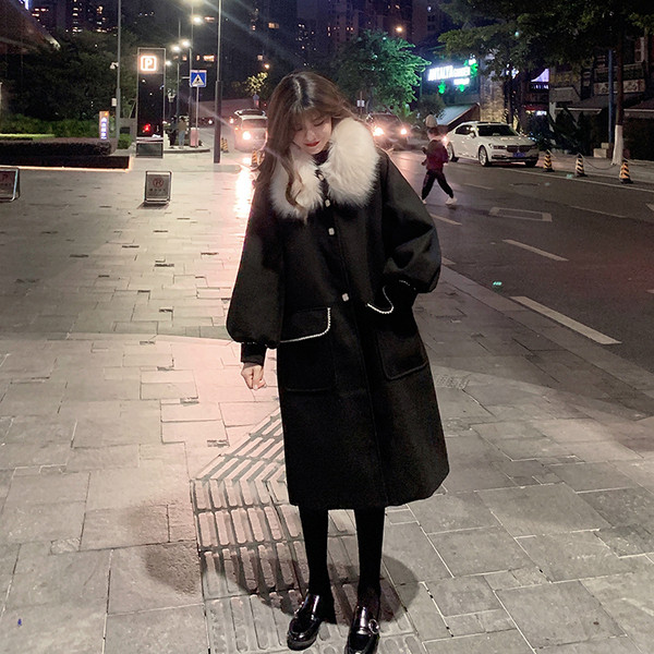 Naiste talvemantli lai mudel sulekrae ja taskutega